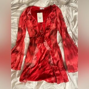 Mini long sleeve dress from Outcast Clothing